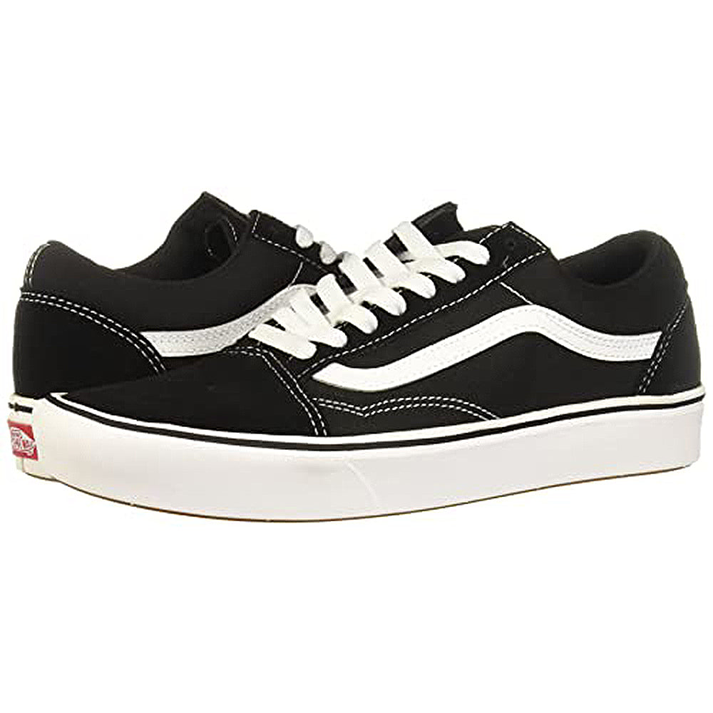 The Vans ComfyCush Old Skool - Unisex sneakers feature a black and white low-top design with white laces, stitching, and the classic Vans side stripe, shown on a plain white background.