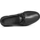 A top view of the Sperry A/O 2-EYE LEATHER mens boat shoe in black leather features visible stitching, black laces tied in a bow, and the Sperry logo embossed on the insole.