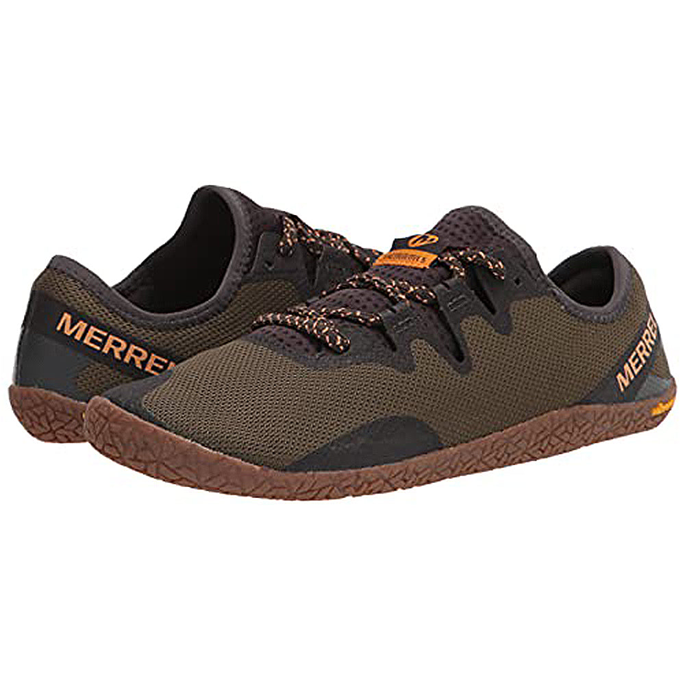 A pair of Merrell Vapor Glove 5 mens minimalist shoes in brown with orange branding, black accents, and textured recycled brown rubber soles are displayed side by side on a white background.