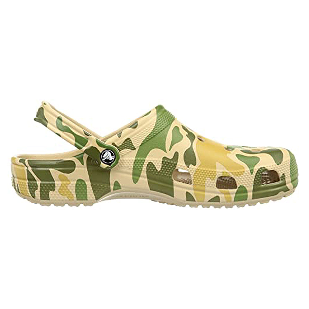 The Crocs Classic Camo Clog - Unisex features a green and yellow camo pattern, side view, pivoting heel strap, and ventilation holes—perfect slip-on shoes for all-day comfort.