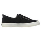 The Sperry Crest Vibe - Womens is a black canvas sneaker with black laces, silver eyelets, and a white rubber sole, shown side view on a plain background. This durable shoe provides great arch support for all-day comfort.