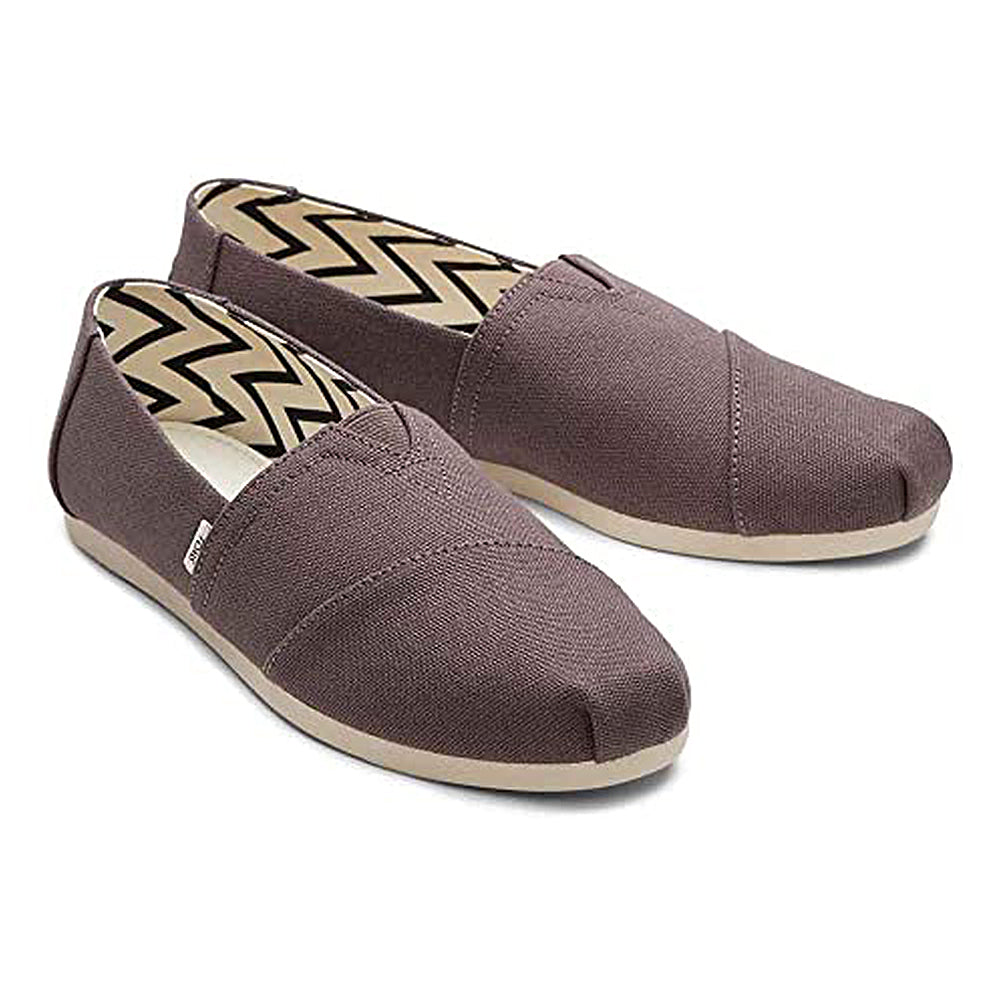 The TOMS Alpargata - Womens are casual slip-on canvas shoes in light brown with beige rubber soles and a zigzag-patterned lining. Part of the earthwise collection, theyre crafted from recycled cotton for eco-friendly comfort.