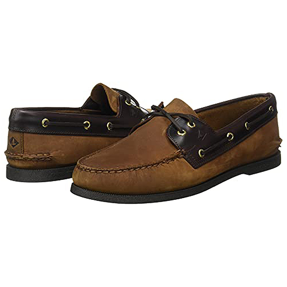 A pair of Sperry A/O 2-EYE LEATHER mens boat shoes in brown leather with dark brown accents, gold eyelets, and black rubber soles, displayed from side and rear views.