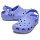 A pair of light purple Crocs Classic Clog - Kids with ventilation holes and ankle straps, displayed on a white background.