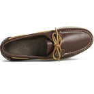 Top view of the Sperry A/O 2-EYE LEATHER mens boat shoe in brown leather, featuring white stitching, tan leather laces, a dark insole, moccasin styling, and a visible rubber outsole edge.