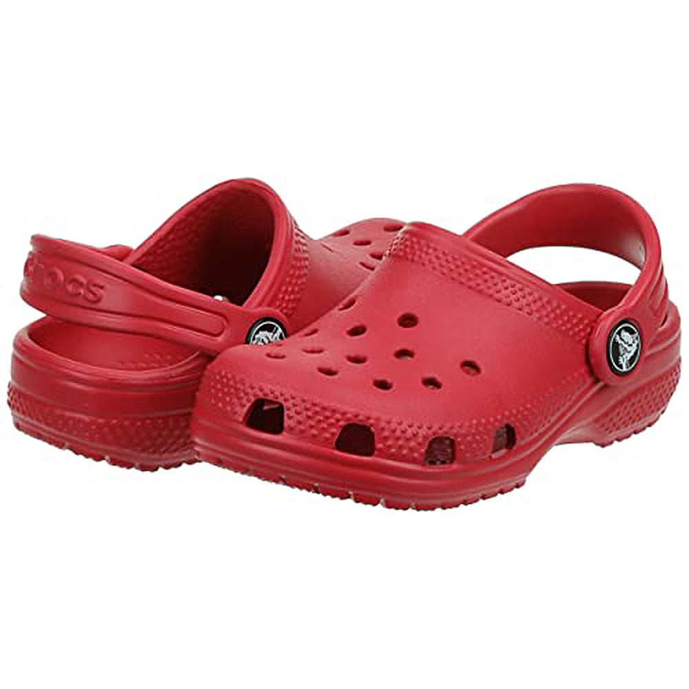 The Crocs Classic Clog - Kids is a pair of bright red clogs featuring ventilation holes and an adjustable heel strap, ideal for children’s footwear, shown against a white background.