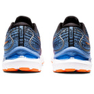 Rear view of a pair of ASICS Gel Cumulus 24 - Mens running shoes with blue and black uppers, orange accents, white FF BLAST-cushioned midsoles, and orange outsoles—an ideal everyday trainer on a white background.