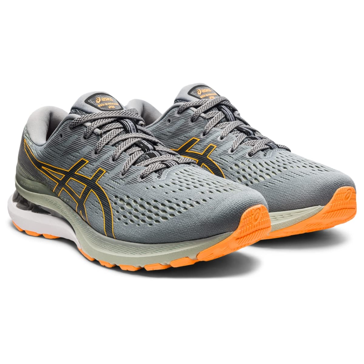 A pair of mens ASICS Gel Kayano 28 stability running shoes in gray with black details, orange soles, and the ASICS logo, featuring GEL technology and shown at an angle on a white background.