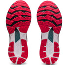 The image displays the soles of ASICS Gel Kayano 28 - Mens running shoes, featuring a red, black, and white pattern with textured grip and teal midfoot accents. The shoes are side by side with the soles facing up.