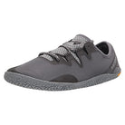 The Merrell Vapor Glove 5 - Men in Rock features a minimalist gray design with a textured sole, mesh upper, and black laces; its low-profile build is lightweight—ideal for running or casual wear.