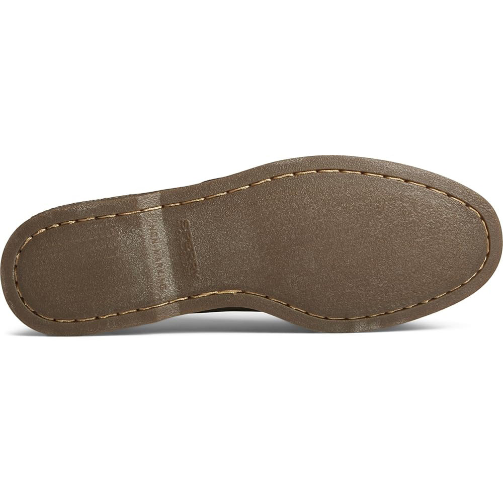 The image shows the brown rubber sole of the Sperry A/O 2-EYE LEATHER mens boat shoe, photographed from below. Visible stitching outlines the edge, and the surface features a smooth yet slightly textured finish.