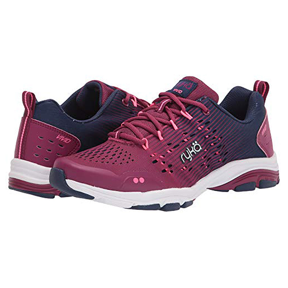 The Ryka Vivid RZX - Women sneakers come in magenta and navy blue with white soles, mesh panels, and a lace-up front. Branded on the side, theyre ideal for water fitness or cross-training.