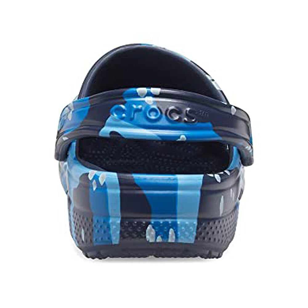 A back view of the Crocs Classic Camo Clog - Unisex in blue and black, with a heel strap, is displayed against a white background.