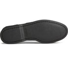 The image shows the black, textured rubber sole of the Sperry A/O 2-EYE LEATHER mens boat shoe from the bottom, featuring visible edge stitching, slight grip grooves, and the Sperry brand name embossed near the center.