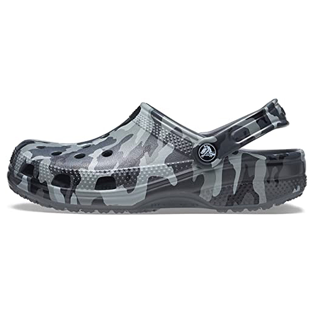 The Crocs Classic Camo Clog - Unisex, shown in side view on a white background, features a gray, black, and white camo pattern, ventilation holes, textured sole, and pivoting heel strap for comfort as water shoes.