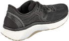 The Saucony Triumph 18 Running Shoe for men features a black mesh upper, reflective heel details, black laces, and a white/tan sole with PWRRUN+ cushioning. A supportive guidance frame is visible from the side and back.