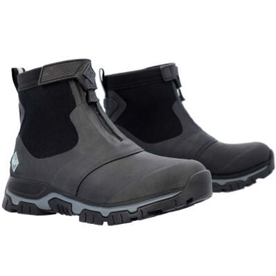 The Original Muck Boot Company Apex Mid Zip - Men: Black ankle-high waterproof boots with rugged soles, side elastic panels, and front zippers are showcased against a white background.