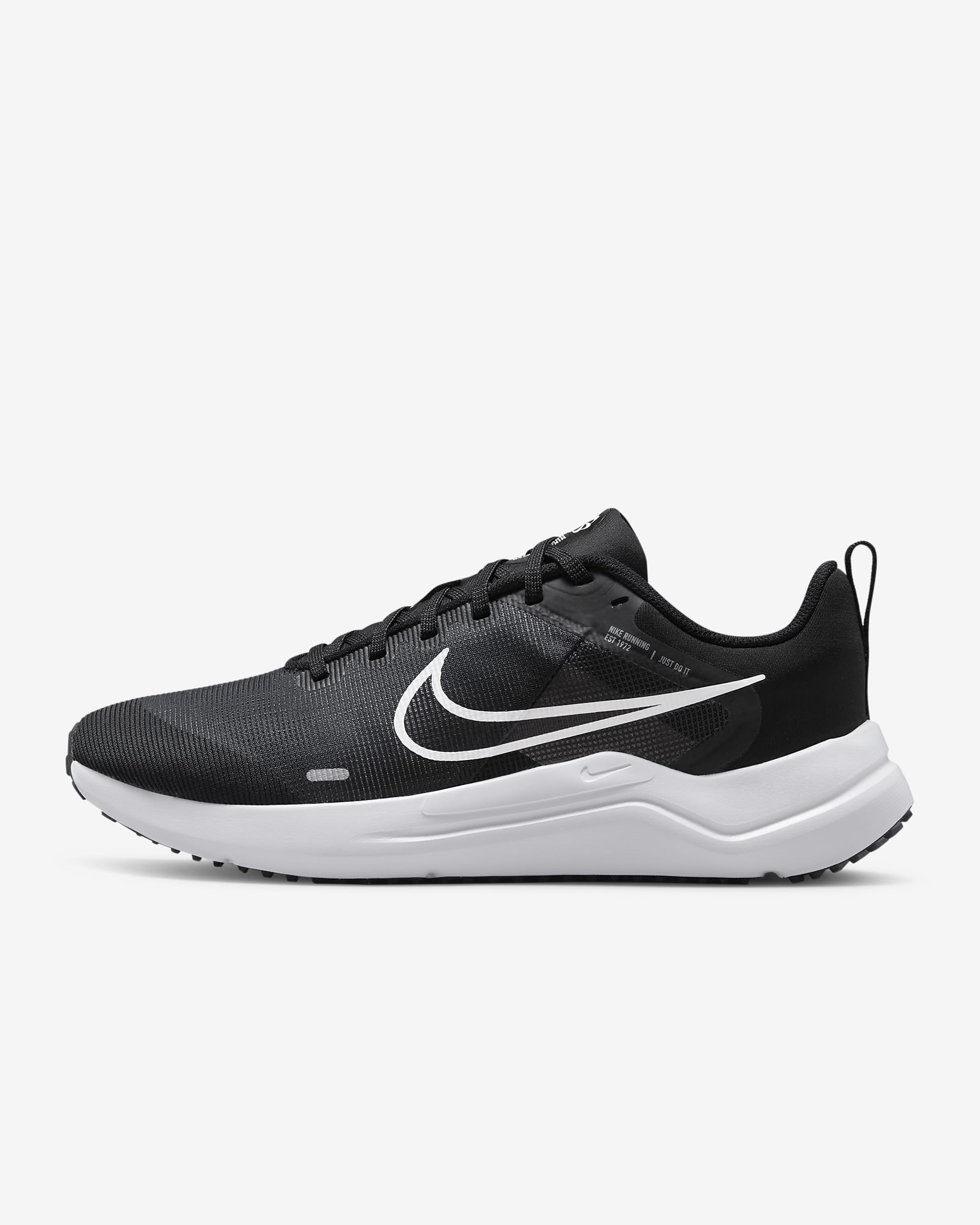 The Nike Downshifter 12 - Women’s running shoe in black features a white swoosh logo and thick white sole, offering lightweight support; shown from the side against a plain white background.