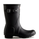 A single Hunter Original Short Rain Boot for women in black, featuring a low heel and decorative side buckle, pictured in profile with the toe pointing right.
