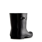 The Hunter Original Short Rain Boots for women in black feature a side buckle detail, shown from the back and side on a white background.