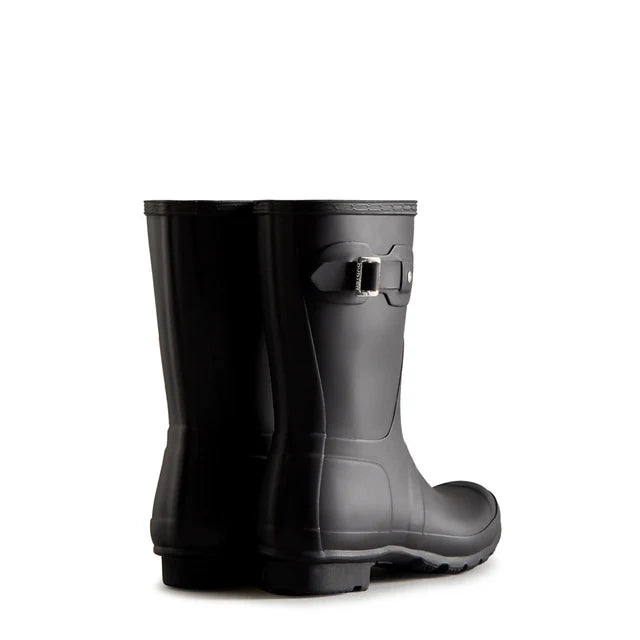 The Hunter Original Short Rain Boots for women in black feature a side buckle detail, shown from the back and side on a white background.