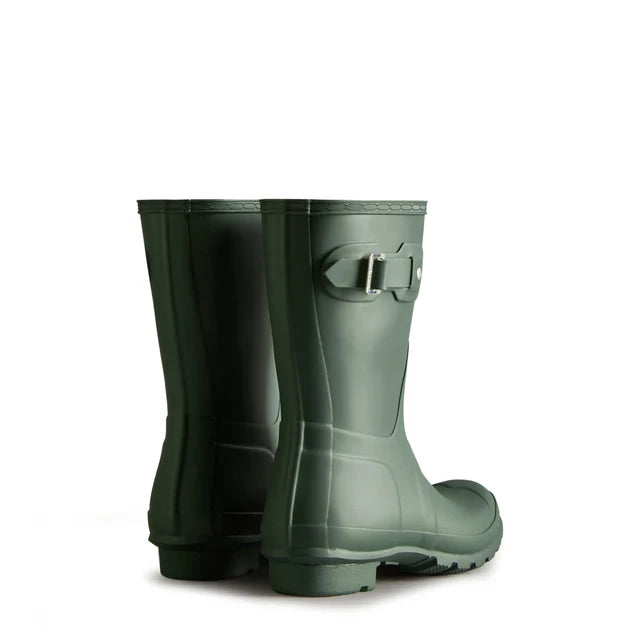 A pair of Hunter Original Short Rain Boots for women in green, featuring side buckles and displayed with the backs facing forward against a white background.