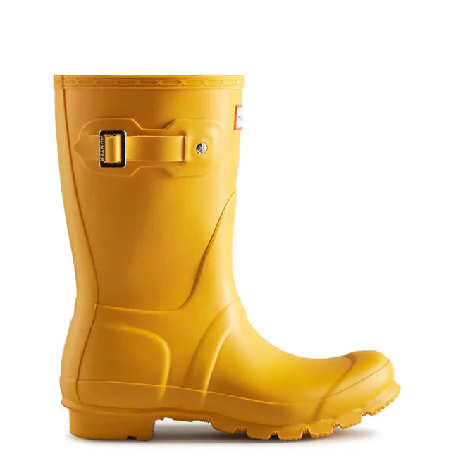 A single Hunter Womens Original Short Rain Boot in yellow, featuring a textured sole, decorative buckle, and mid-calf height, displayed in side view against a white background.
